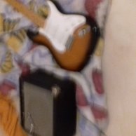 Fender electric guitar with amplifier that has been barely used
