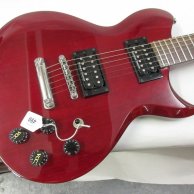 1998 Washburn W1-65prp solid mahogany electric guitar finished in translucent cherry red